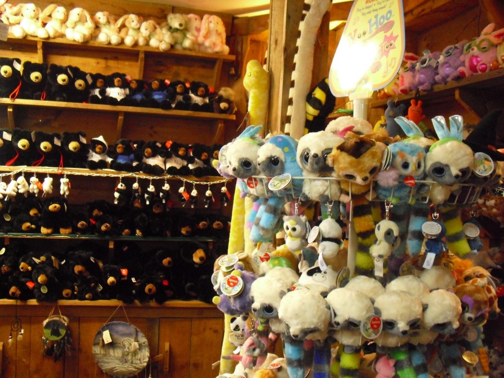 stuffed animals displayed to the rafters in General Store - stuffed bunnies, monkeys and other animals on shelves