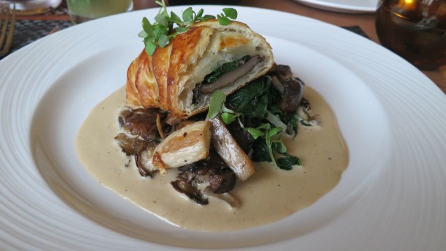 Golden brown pastry stuffed with seasoned wild mushrooms