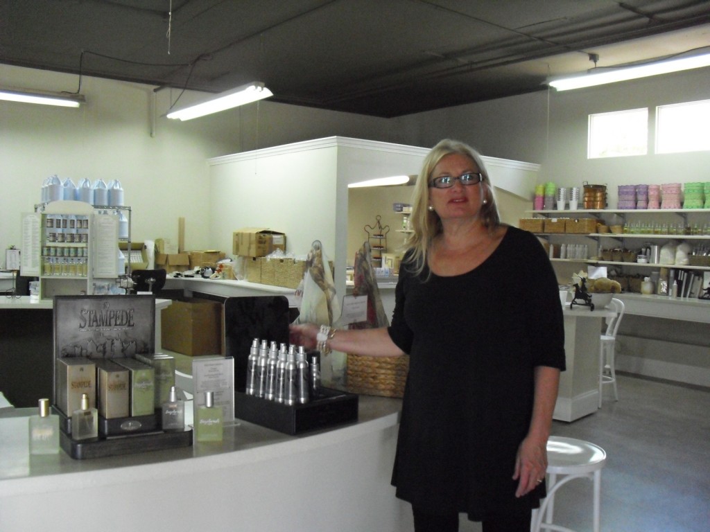 Owner of only perfumery in the US with operations under one roof standing in her factory