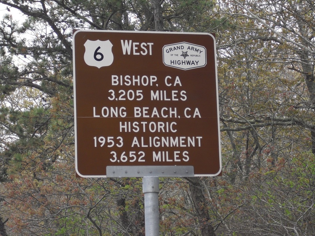 Brown US Route 6 Sign stating Bishop, CA 3,205 Miles Long Beach, CA 3652 Miles