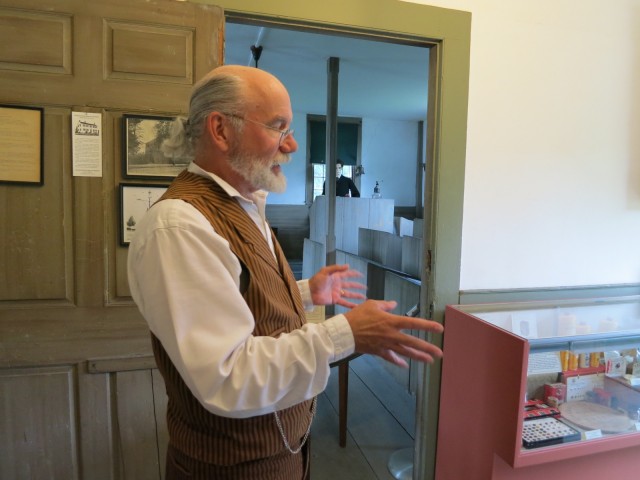 Guide Chris Richard dressed in Victorian man's business suit for walking tour of Fairhaven, MA #Massachusetts @GetawayMavens