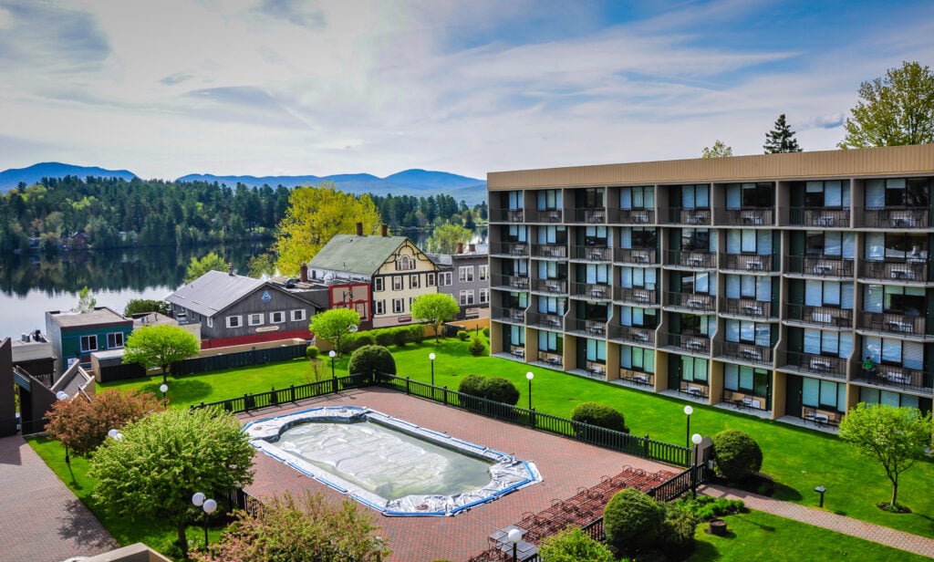 High Peaks Resort pool and grounds overlooking Mirror Lake