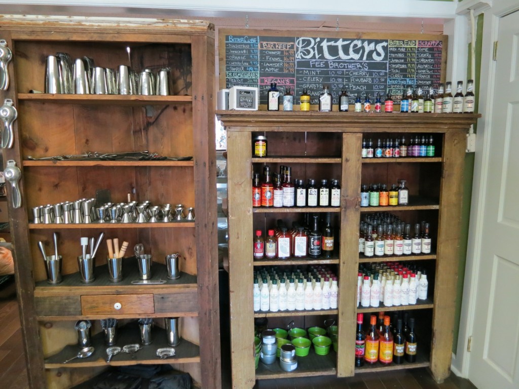 Shelves of bar tools and selection of bitters at a shop in Beacon NY