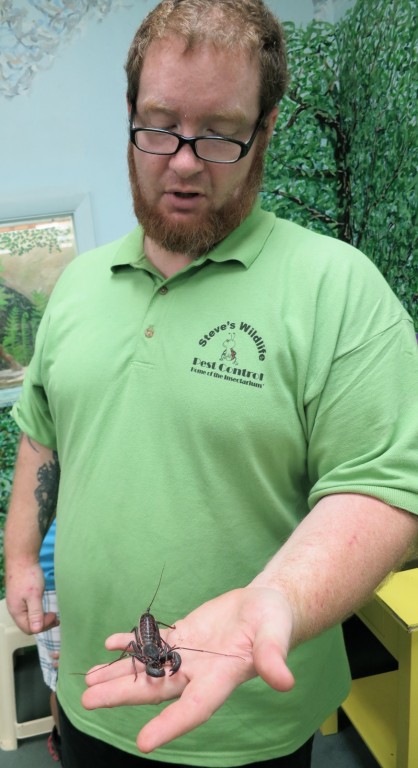 Docent holding scorpion at Insectorium in North Philly PA