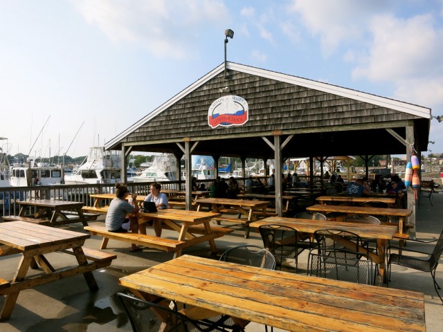 picnic tables of fried New England fare hotspot, Captain Scotts on New London CT docks