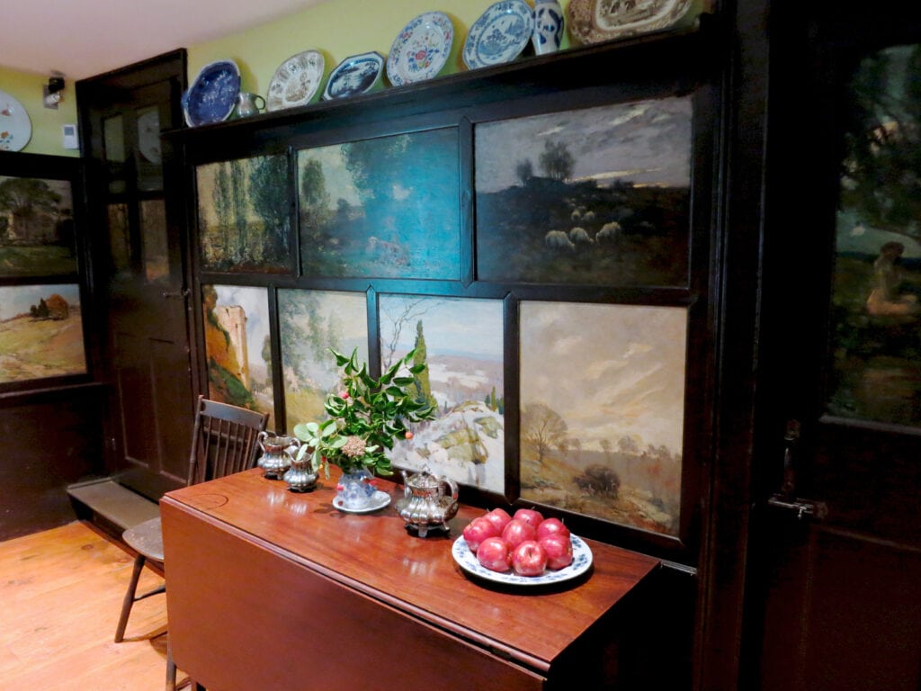 Impressionist art on dining room panels at Florence Griswold Home and Museum Old Lyme CT