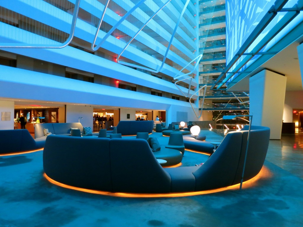 Conrad Hotel Downtown NYC lobby bathed in blue.