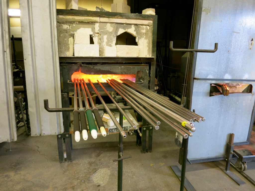 Hollow and solid pipes await glass artists at Diablo Glass School, Boston MA