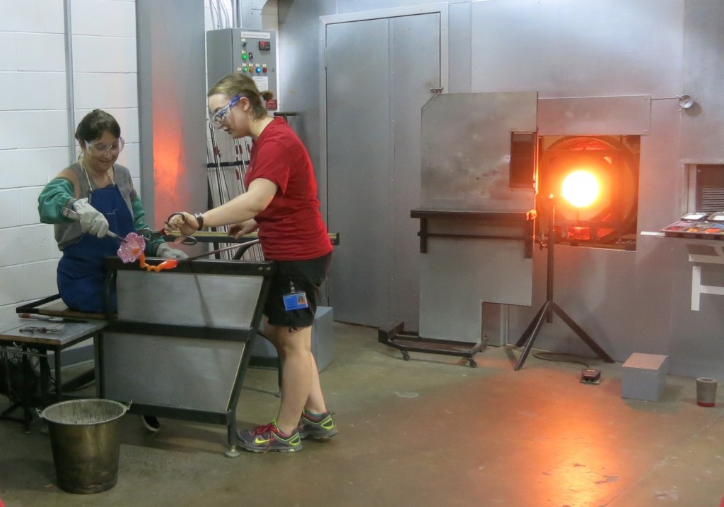 Author making glass flower at Corning Museum of Glass, Corning NY