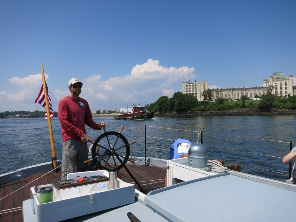 Gundalow Captain sailing past the crumbling but still grand decommissioned Naval prison referenced in the movie “The Last Detail” - Portsmouth Harbor NH