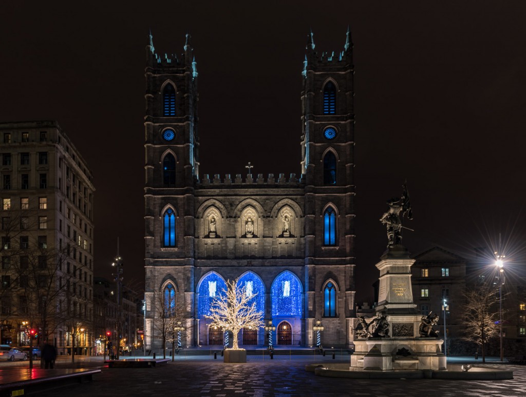 Notre-Dame Basilica lit up at night in Old Montreal, Quebec.