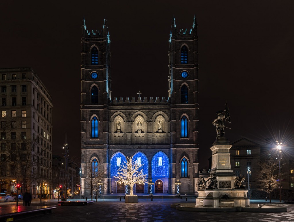 Notre-Dame Basilica lit up at night in Old Montreal, Quebec.