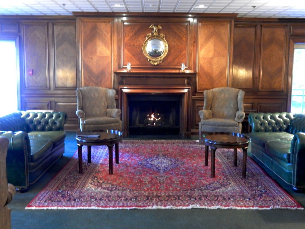 Parlor with fireplace, Harraseeket Inn Freeport ME