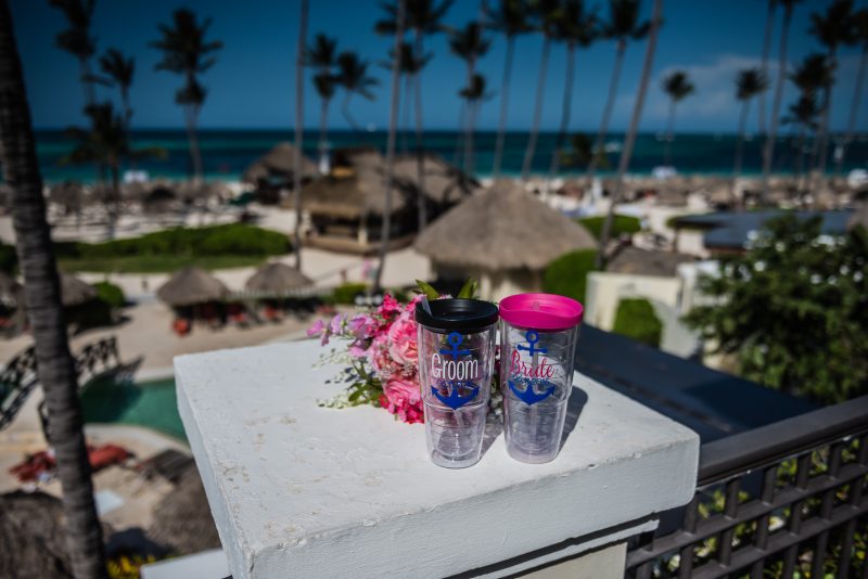 Bride and Groom Cups and flower bouquet at Now Larimar Resort in Punta Cana, Dominican Republic.