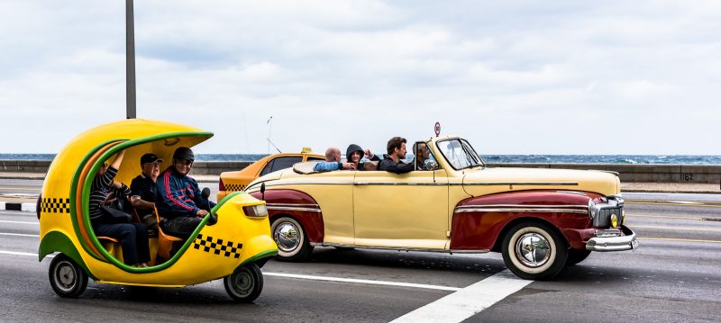 Cocomobil and Vintage Car on Malecon - Havana, Cuba