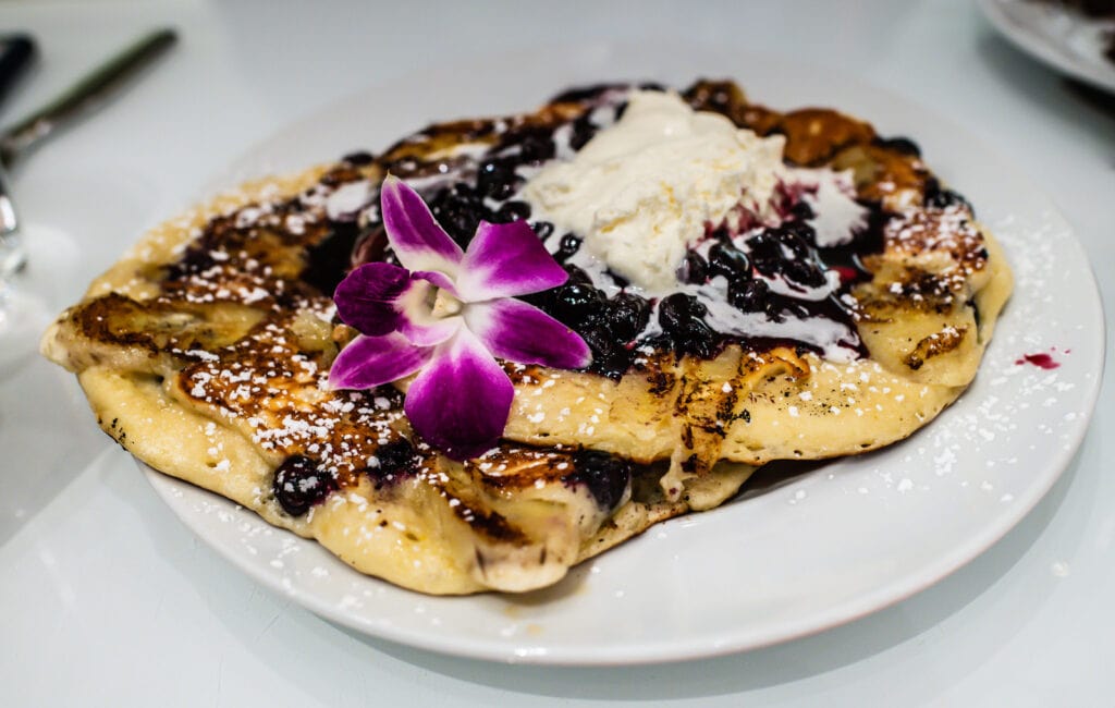 Blueberry pancakes served at Normas Restaurant at Parker New York Hotel