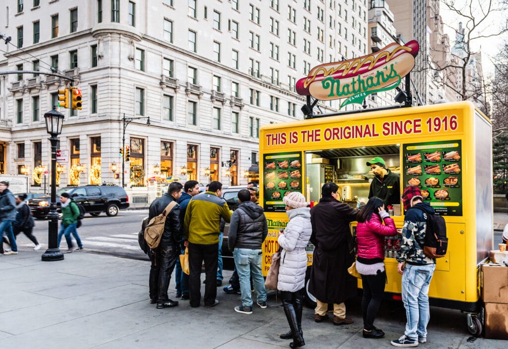 Nathans Hot Dog stand at entrance to Central Park