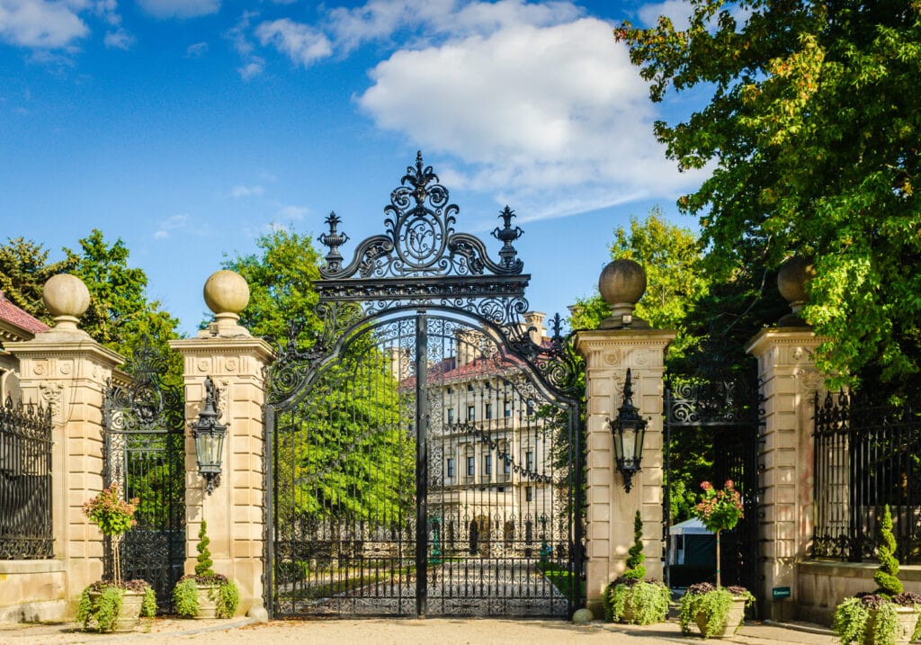 Elaborate black iron gate entrance at the Breakers Mansion in Newport RI.