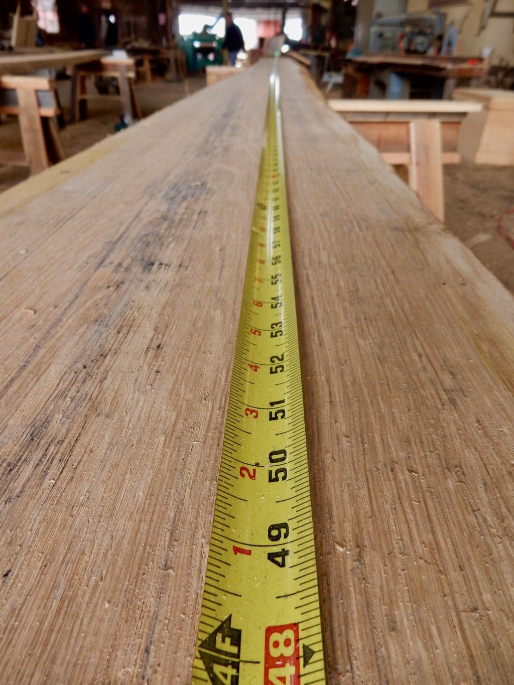 Measuring wood planks for restoration of Mayflower II Mystic CT
