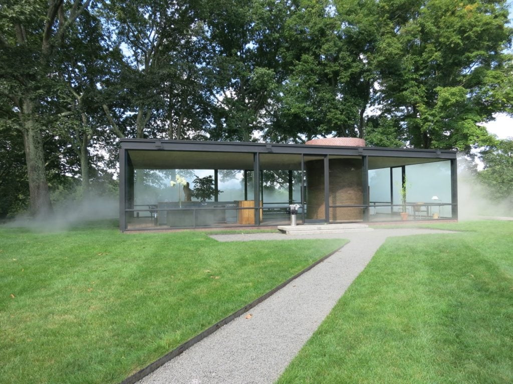 Glass House with manmade "mist" art installation, New Canaan CT