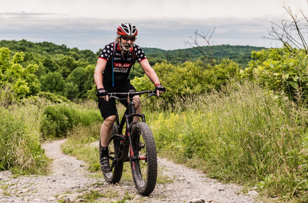 Rich Cruet, owner of The Bicycle Doctor, shows us how it's done on a Highland Lakes State Park trail.