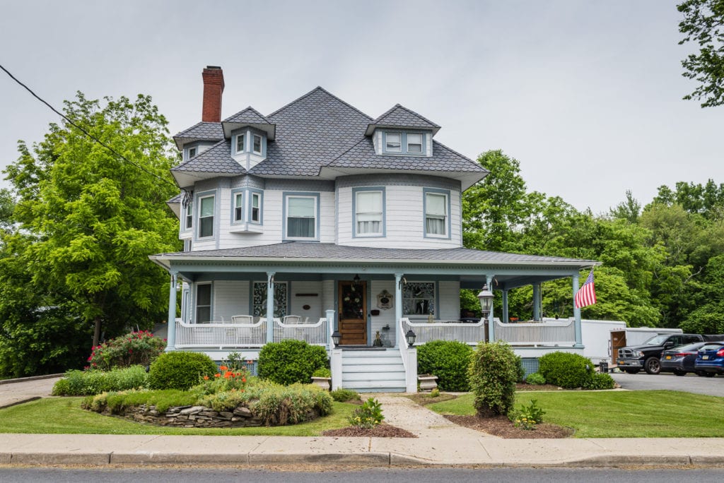 Front exterior view of Pine Bush House, a Victorian manor in Pine Bush NY.