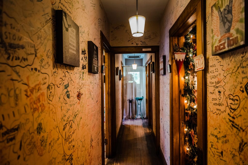 Signed hallway in the upstairs apartments of Cobbler and Co gift shop in Sharon Springs NY