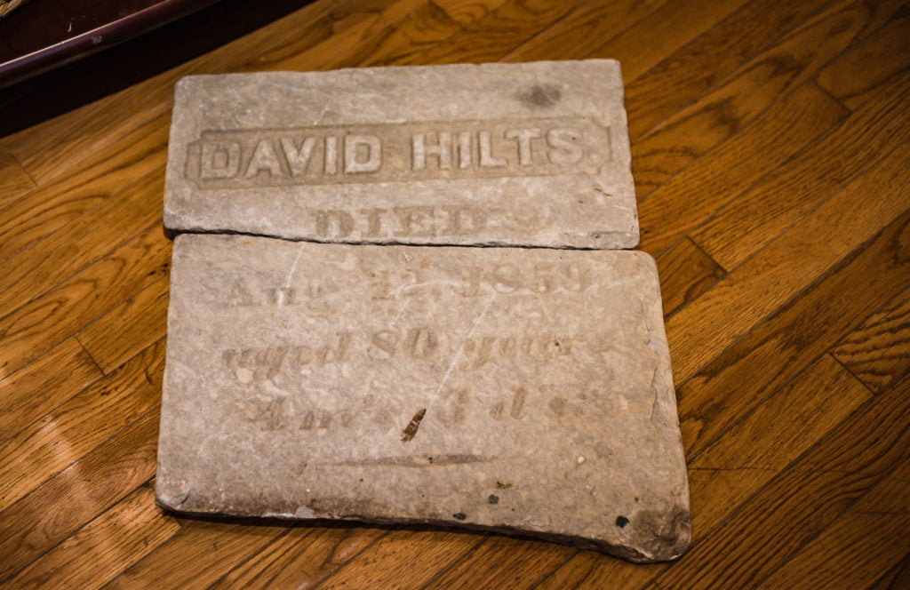 Broken headstone at Grapevine Farms