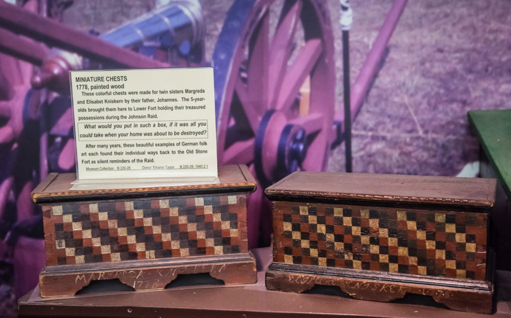 Two German folk art miniature wooden chests on display at the Old Stone Fort Museum in Schoharie NY.