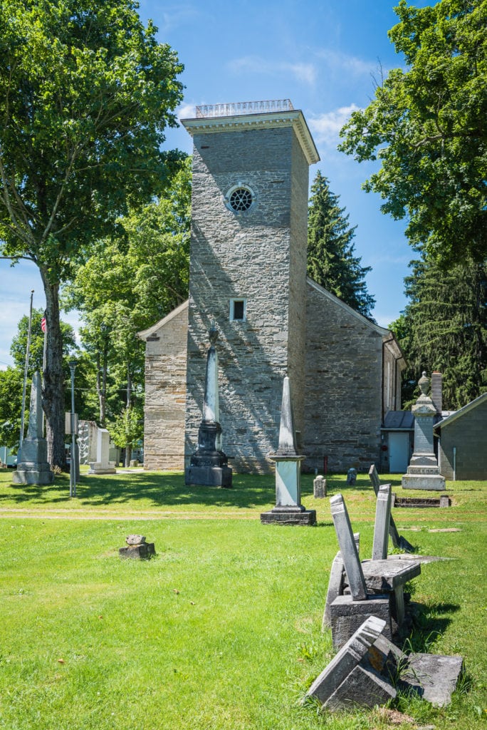 The Old Stone Fort Museum Tower overlooking cemetery in Schoharie NY.