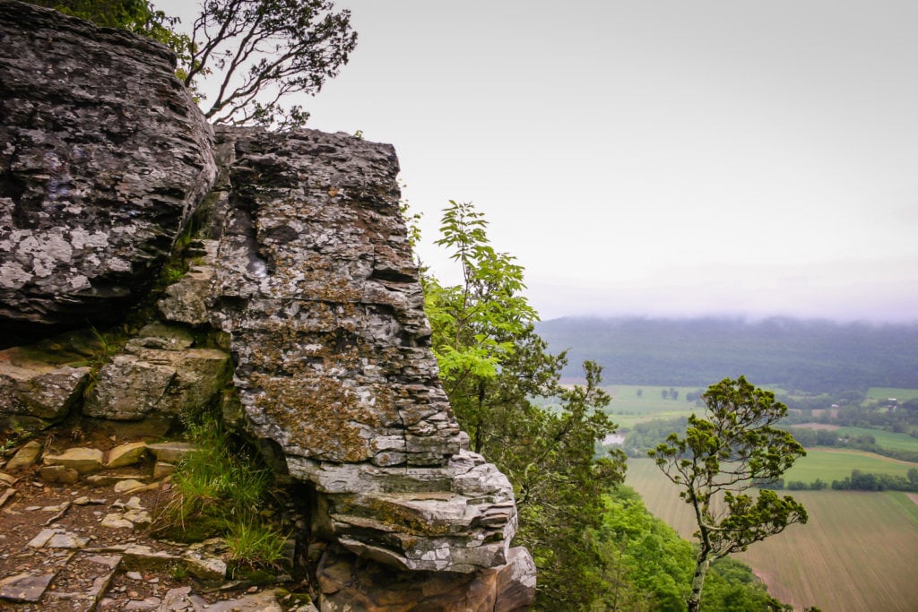 Rock cliff shaped like a nose overlooking Schoharie Valley at Vromans Nose Nature Preserve in Upstate New York.