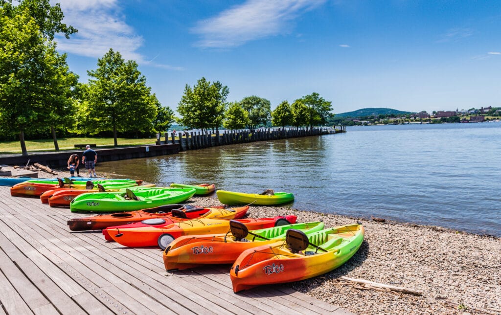 Kayaks line Hudson River shoreline in Beacon NY