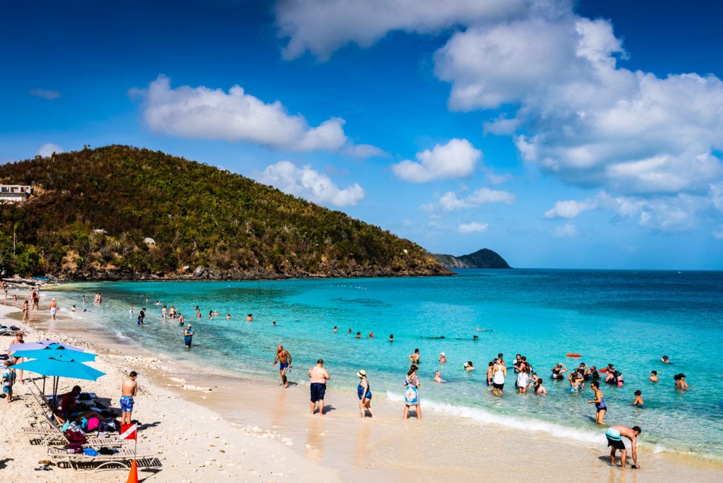 Tourists enjoying Coki Point beach in St. Thomas US Virgin Islands