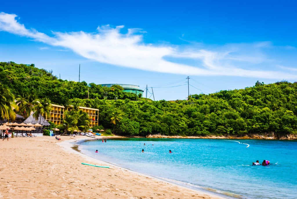 A quiet stretch of white sand beach at Lindbergh Beach in St. Thomas US Virgin Islands.