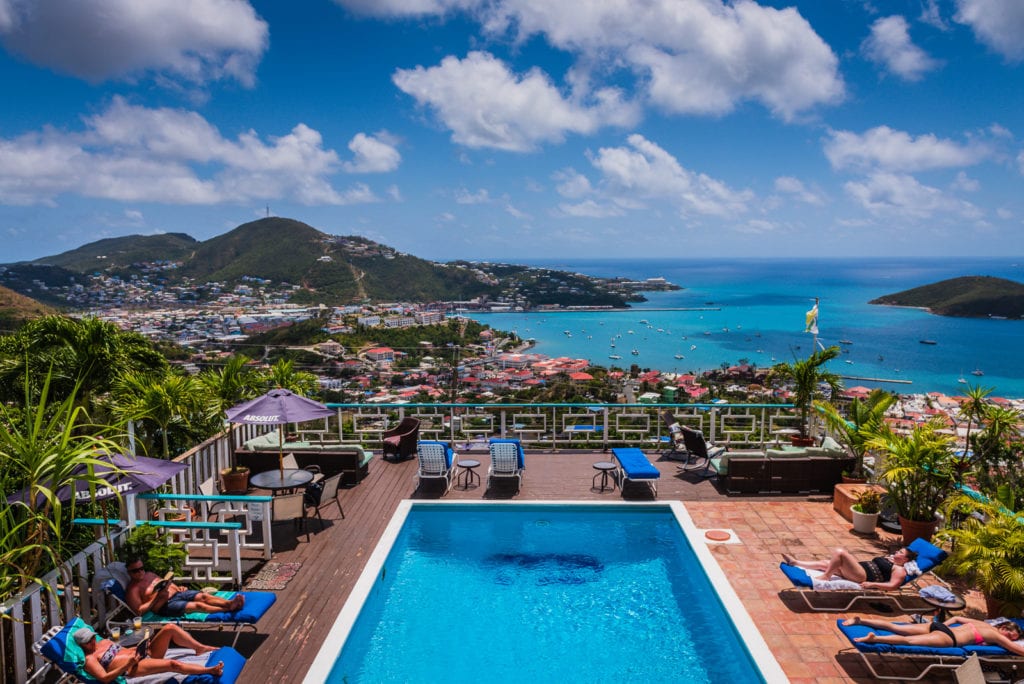 Sunbathers around the pool at Mafolie Hotel in St. Thomas US Virgin Islands.