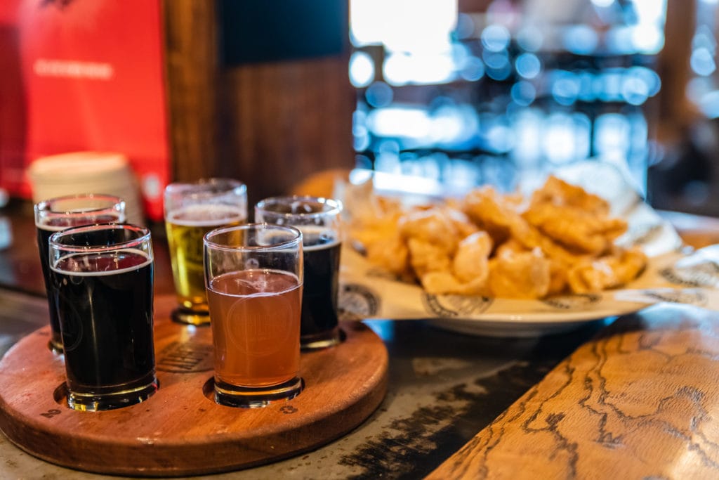 Beer sampler and pork rinds at Schlafly Brew Pub in St. Louis MO.