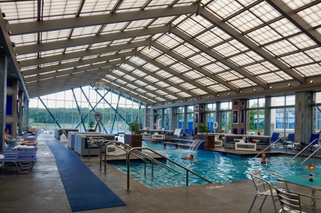 Huge indoor pool in glass enclosure at Mount Airy Casino Resort