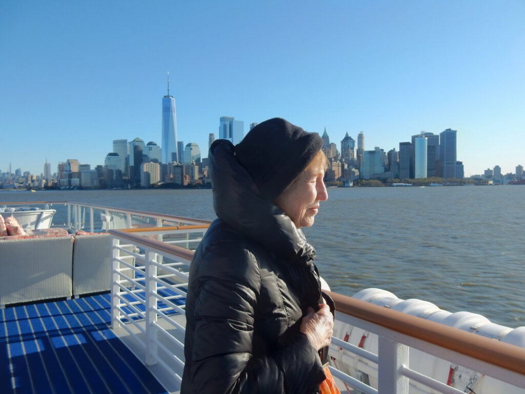 Helene enjoying sun on a cold NYC day American Cruise Lines Constitution