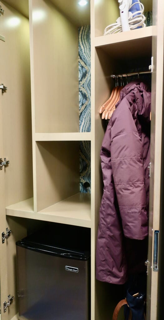 Compact cubby closet in Crowne Plaza guest room Midtown Manhattan