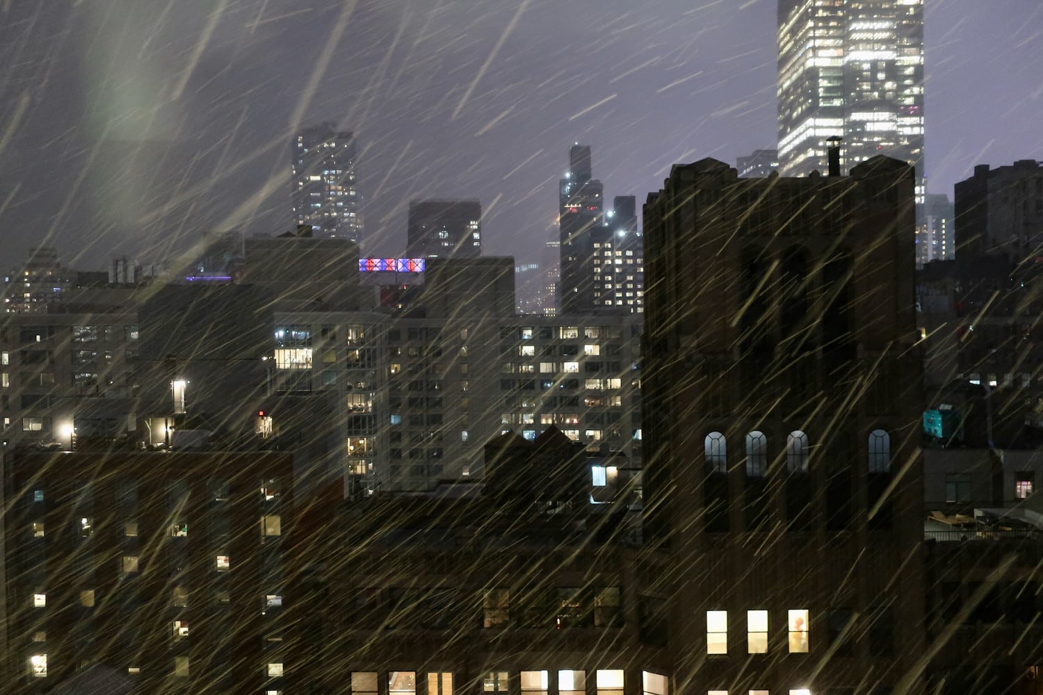 NYC on a snowy night from room at Crowne Plaza HY36
