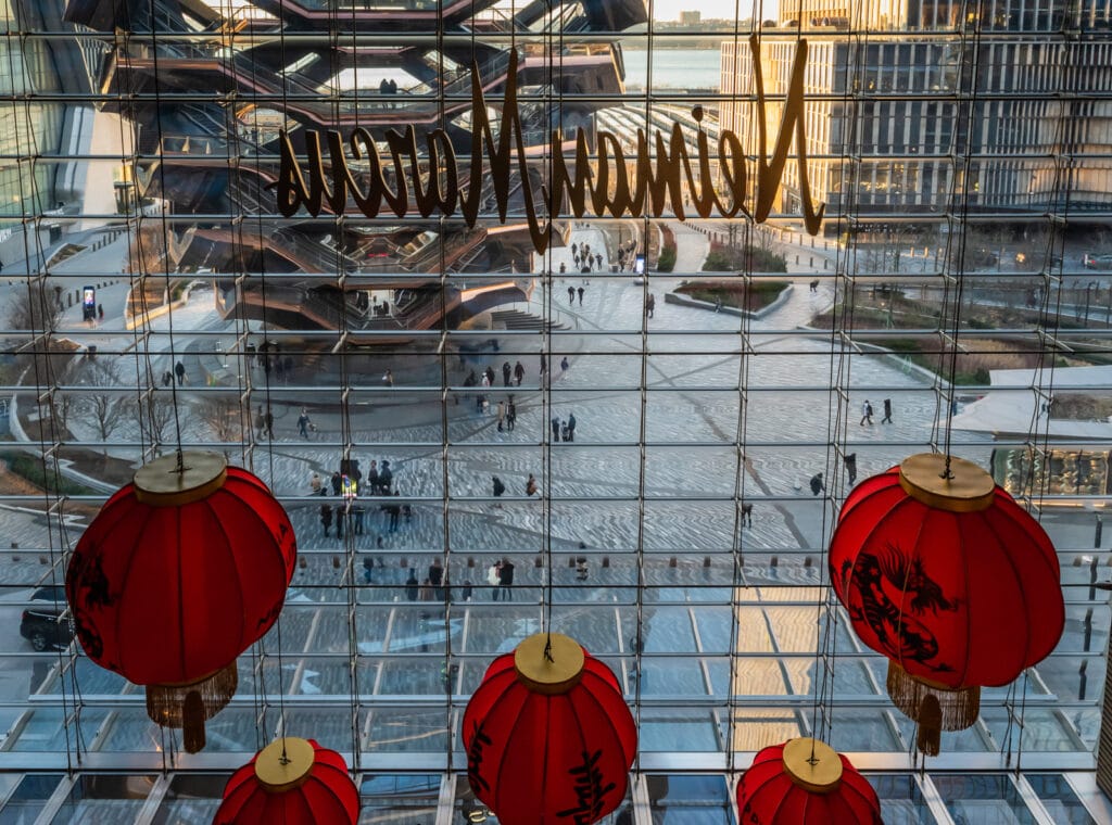 The Vessel seen through Neiman Marcus Window at Hudson Yards Mall.