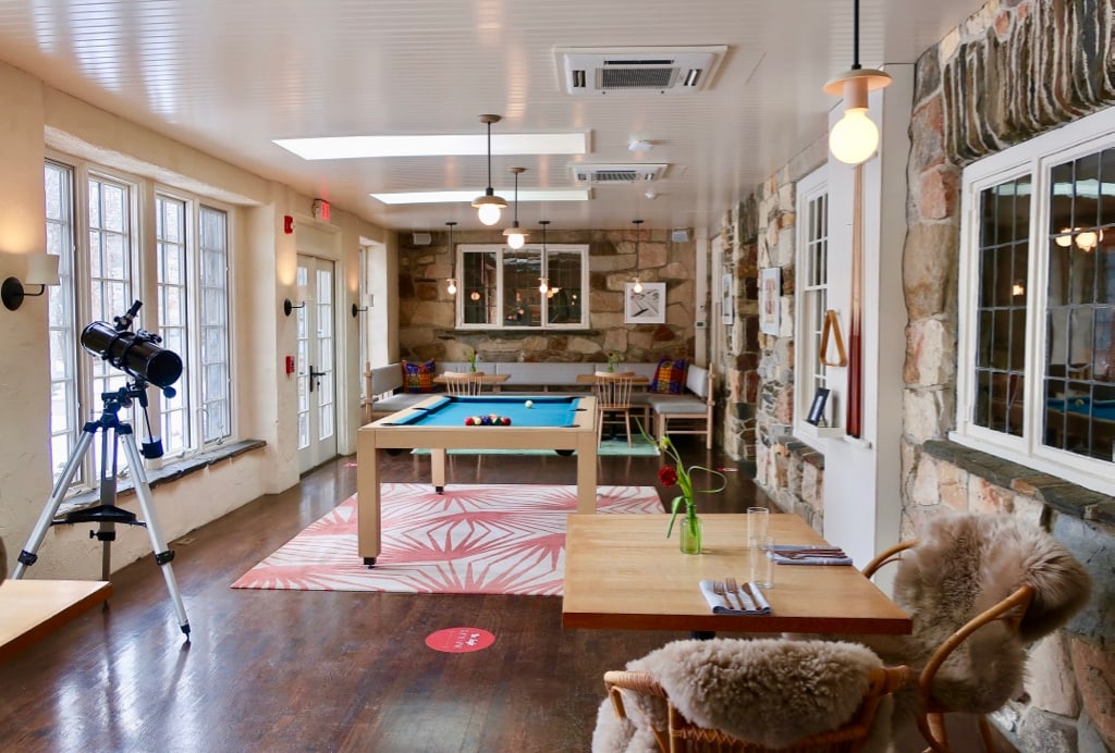 Troutbeck Sunroom doubles as billiards and dining room.