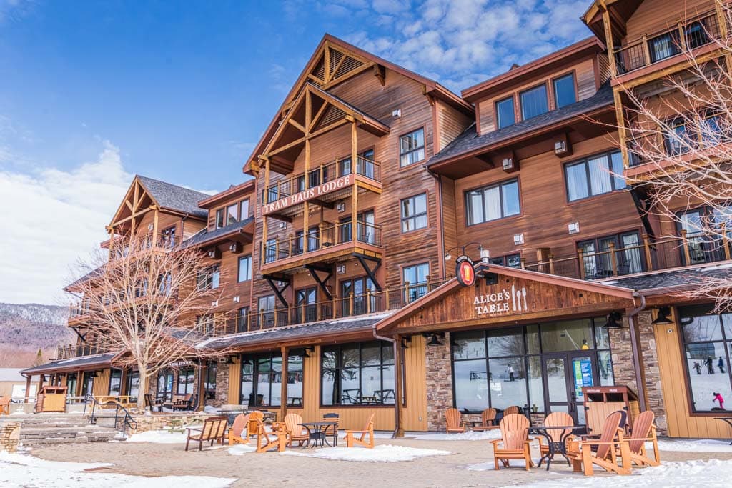 Slopeside seating in front of Alice's Table Restaurant in Tram Haus Lodge at Jay Peak Resort.