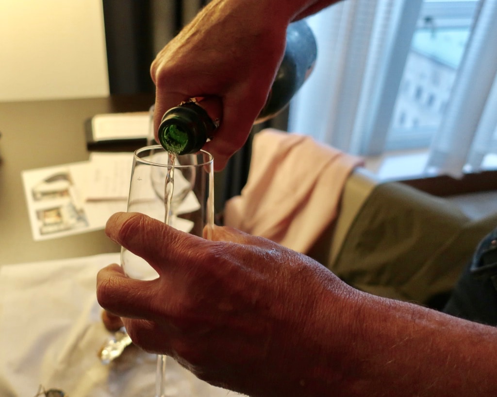 Pouring Champagne to Celebrate The Everyday Langham NY