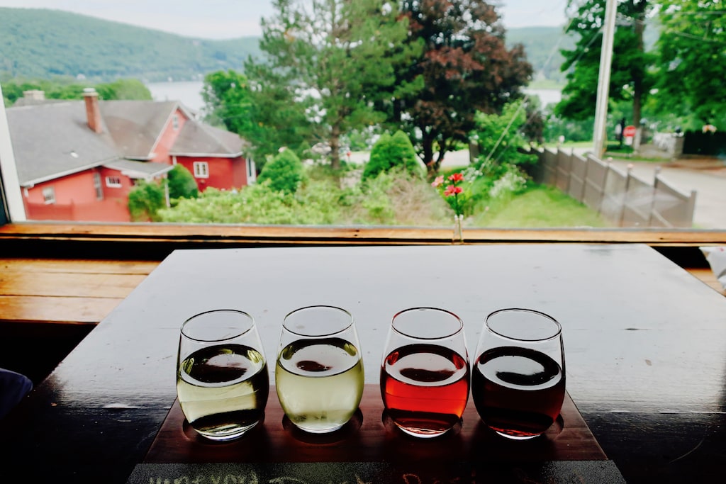 Wine flight with view of Lake Waramaug from Hopkins Vineyard loft Warren CT