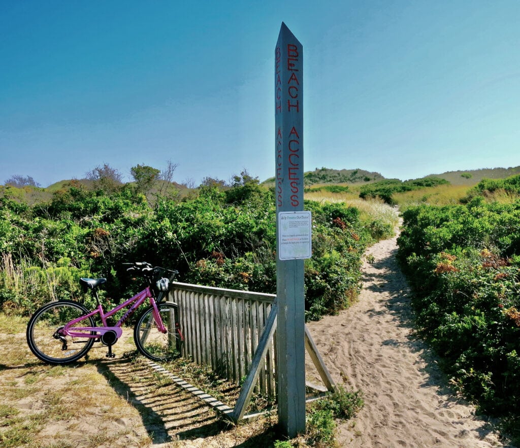 Beach access at Block Island RI beach with bicycle.