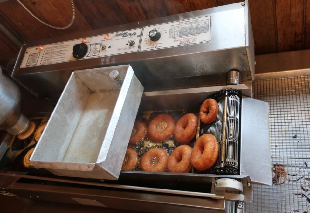 Old fashioned donut machine at Breeze Hill Farm Peconic NY