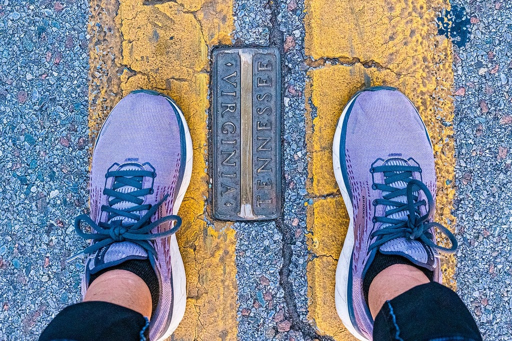 Two feet straddle state line on State Street in Bristol TN-VA.