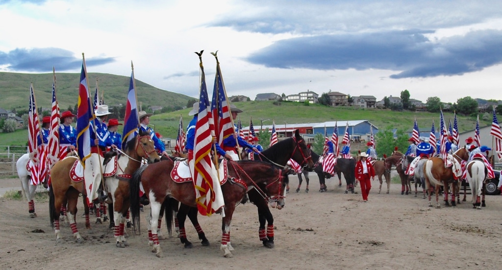 Westernaires practice in full costume at sunset in the Rocky Mountain town of Lakewood