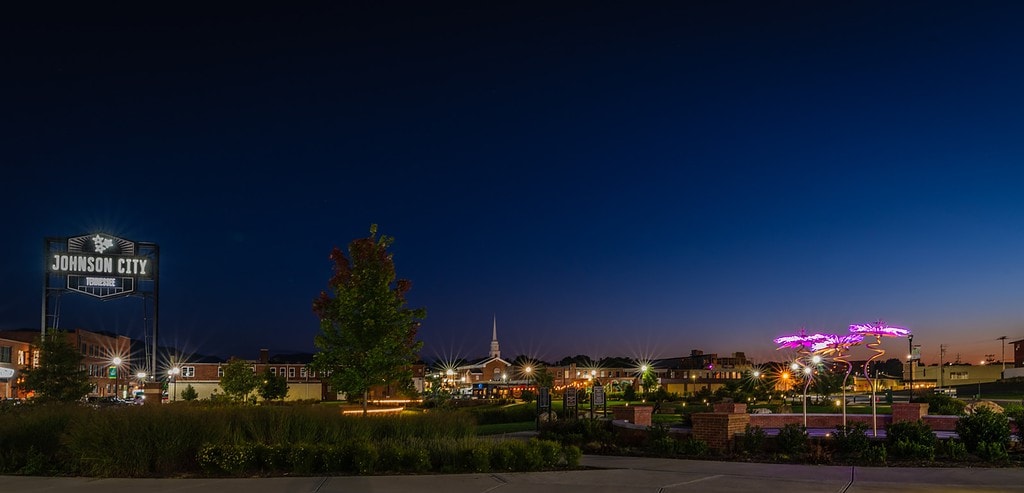 Johnson City TN sign at King Commons during evening blue hour.